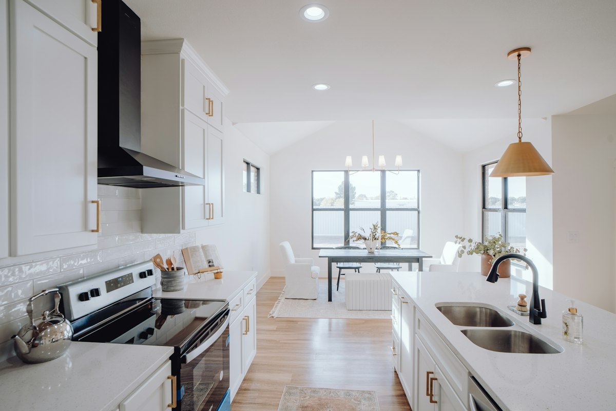 Clean, bright apartment kitchen with appliances and counter space