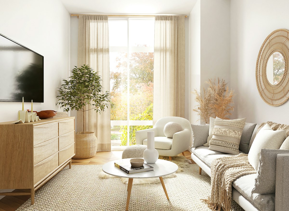 Bright apartment living room with a large window and comfortable seating